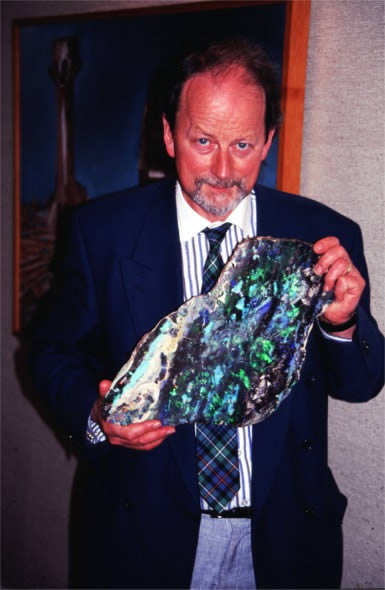 Alan Hodgkinson holding large opal slab