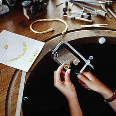 Jeweller working at the bench